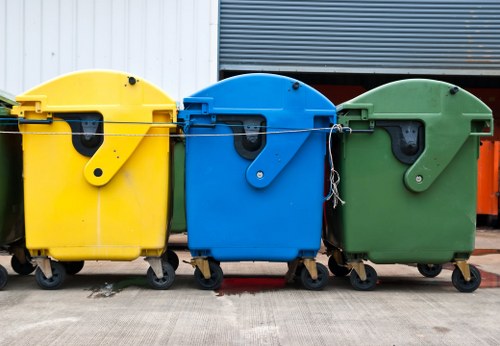 Wheelie bins and commercial waste containers outside a Barkingside business