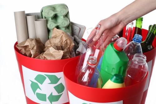 Professional waste clearance team removing debris from a building site
